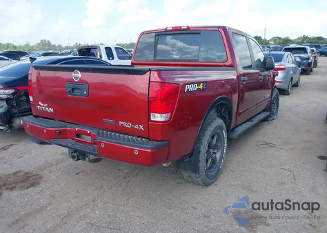 2015 Nissan Titan Pro-4X z USA, uszkodzony, nr VIN 1N6BA0EC8FN506760